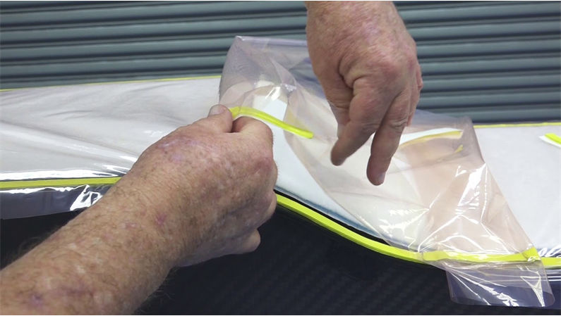 hands vacuum bagging