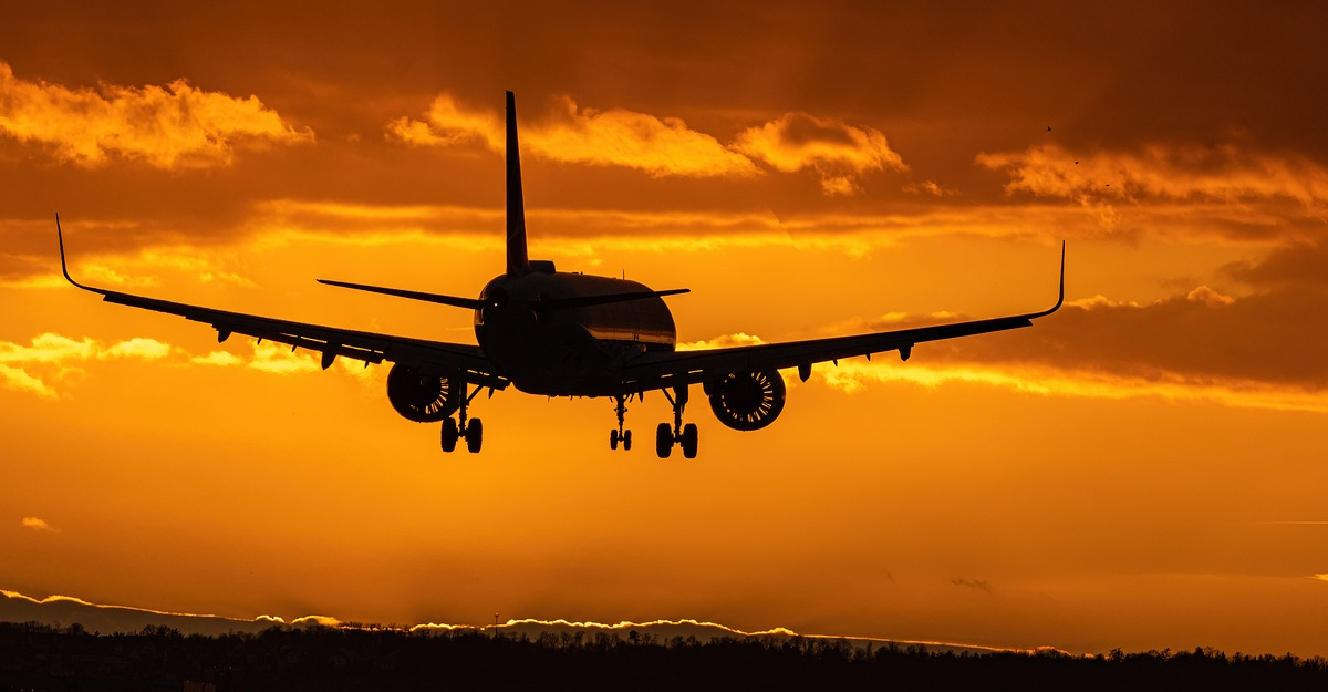 plane in evening sky