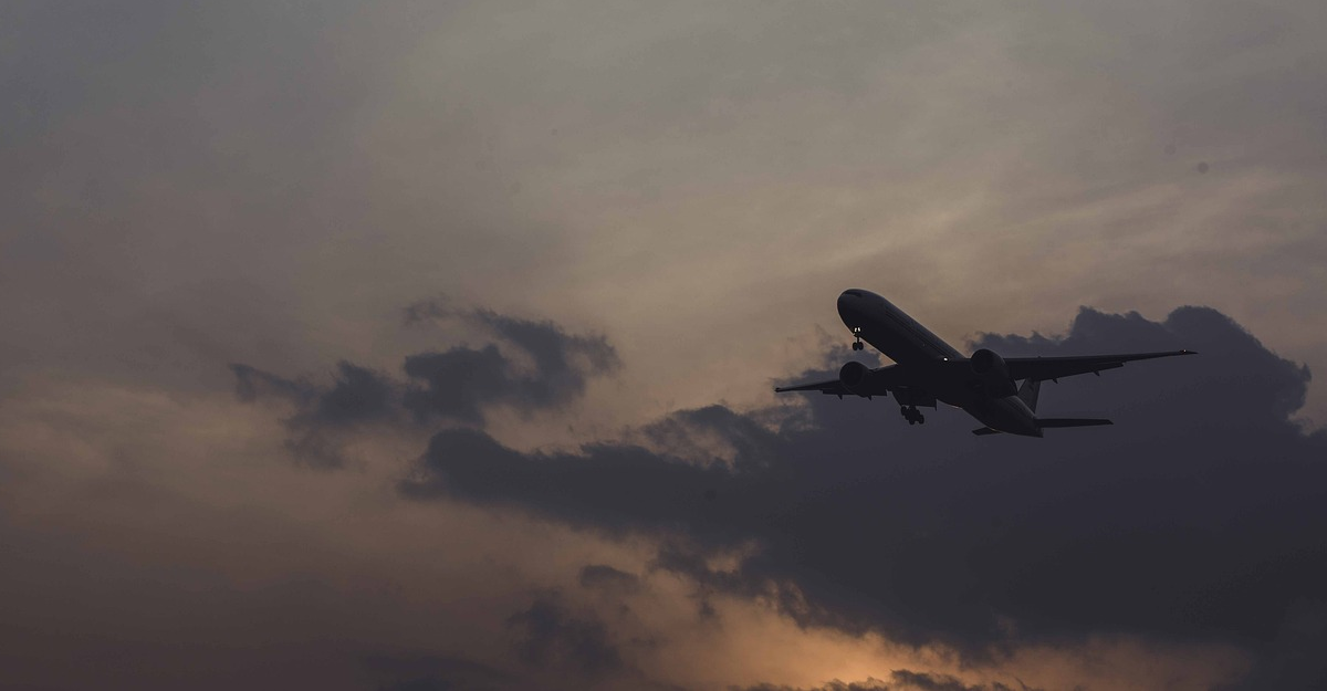 plane in clouds