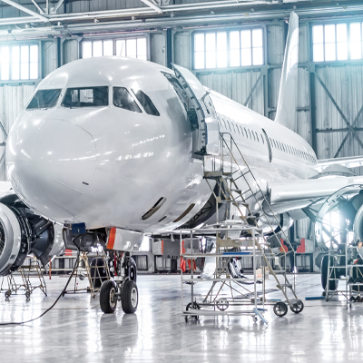 Large aircraft in hangar